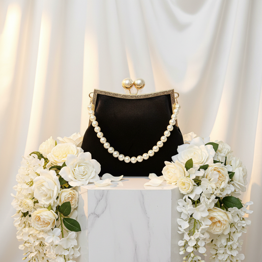 Black Velvet Pearl Strand Handle Clutch Bright Background